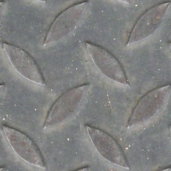Seamless texture of sheet of grey metal with embedded leaf-like shapes in surface.